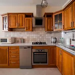 Apartment National Stadium Cozy Retreat By Bookinghost